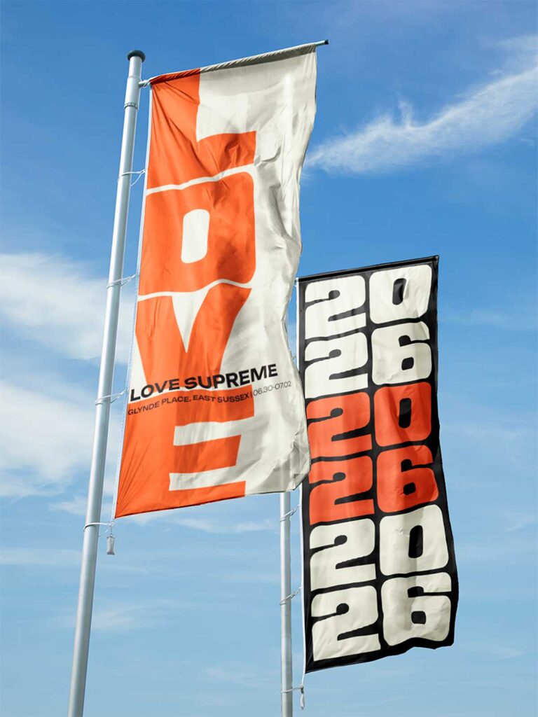Photo of Love Supreme music festival flags in the sky.